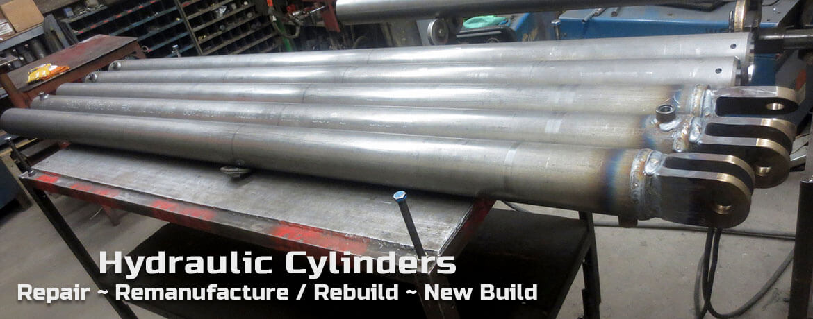 Row of repaired hydraulic cylinders