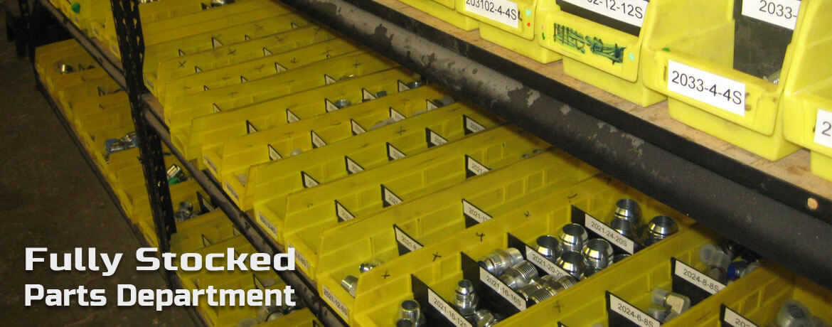 Rows of bins containing hydraulic parts